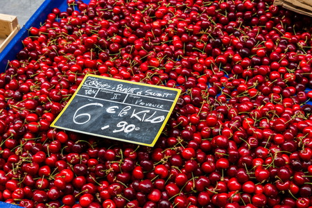 red cherries in street marketの写真素材