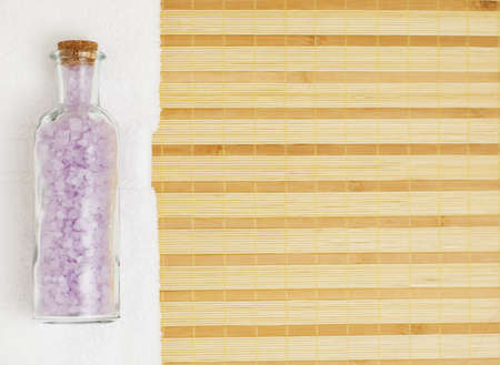 Brightly light spa display on top of a bamboo matの写真素材