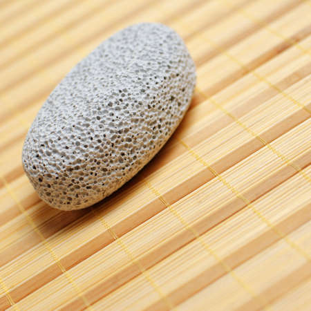 Pumice stone close up on a bamboo mat.の写真素材