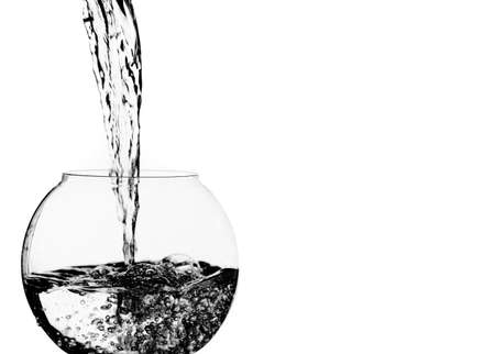 Crisp, cool, clean water pouring into a bowl.の写真素材