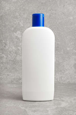 Bathroom object photographed against a granite backdrop.