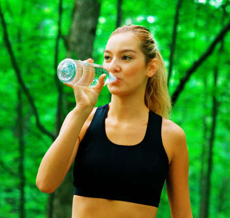 Blonde haired woman exercising, from a complete series of photos.