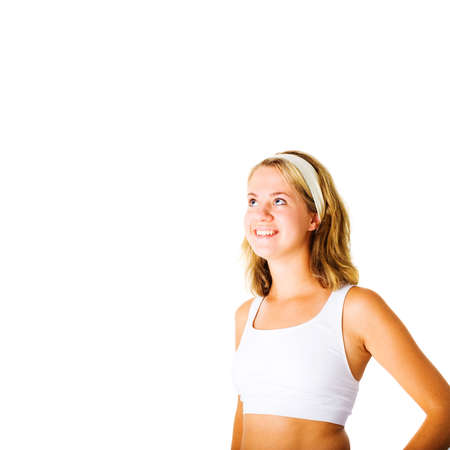 Young woman working out on a white background, from a complete series.の写真素材