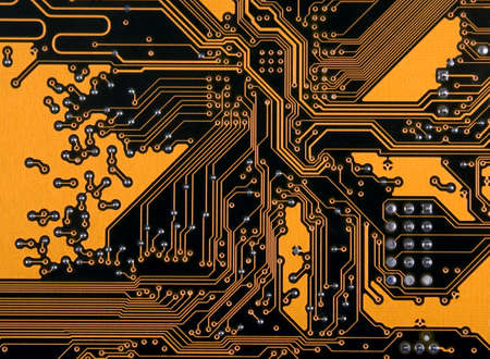 There is yellow computer microscheme with electrical waysの写真素材