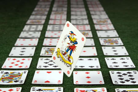 There are many cards on green background