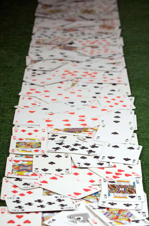 There are many cards on green background