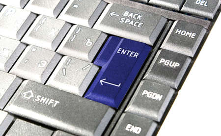 There is blue enter key on keyboardの写真素材