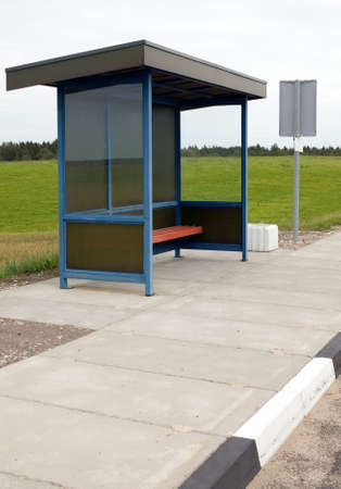 There is a bus stop on nature green backgroundの写真素材