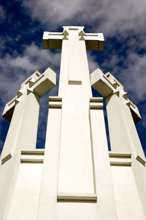 There are three white crosses on cloudy sky backgroundの写真素材