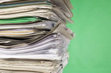 There are documents and papers on green backgroundの写真素材