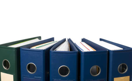 There is documents and catalogs on red backgroundの写真素材