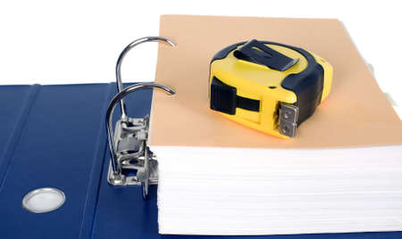 Block of documents with a yellow metreの写真素材
