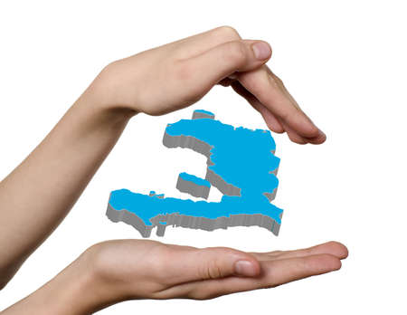 Child hands with Haiti blue map in centerの写真素材