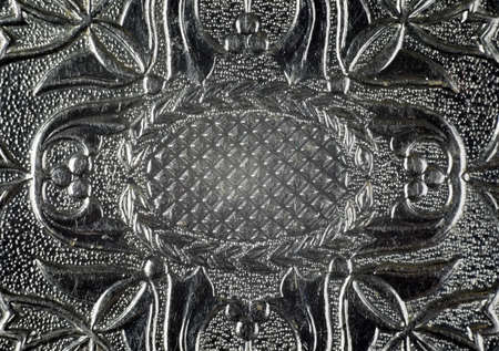 Ornaments with flowers on metal material, greyの写真素材