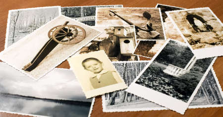 Composition of a lot of pictures with ornamented edges on tableの写真素材