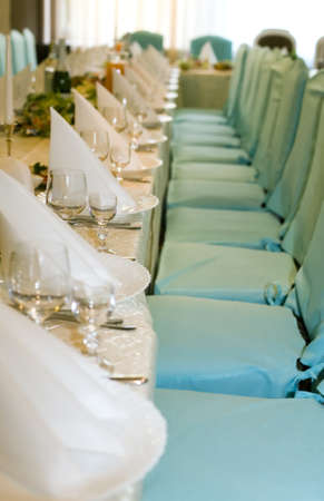 Table with food and dishes for wedding partyの写真素材