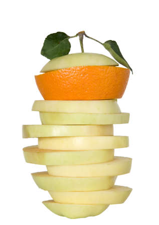 There is tasty yellow apple in peaces with one orange fruit sliceの写真素材