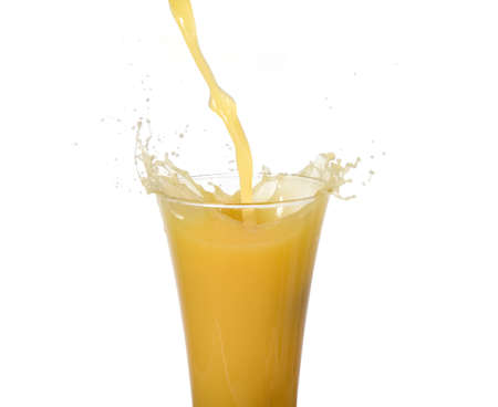 Splash with bubbles of fresh squeezed orange juiceの写真素材