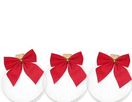 White christmas decoration balls with ribbons on itの写真素材