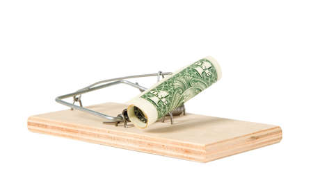 A mouse trap with money on itの写真素材