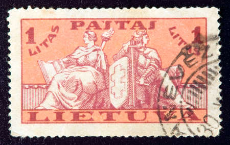 LITHUANIA - CIRCA 1934: stamp printed by Lithuania and shows country live, circa 1934のeditorial素材