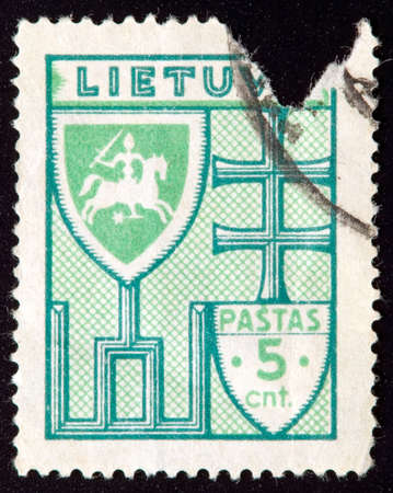 LITHUANIA - CIRCA 1934: stamp printed by Lithuania and shows cross, circa 1934のeditorial素材