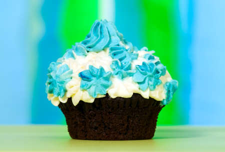 Small birthday cake made from white and blue creamの写真素材