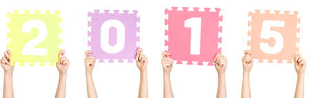 Child is holding number 2015, new year conceptの写真素材