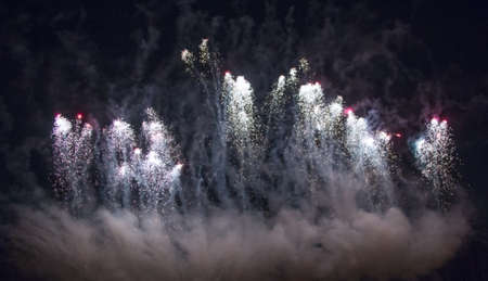 Colorful fireworks on the sky background, christmas and new year concept