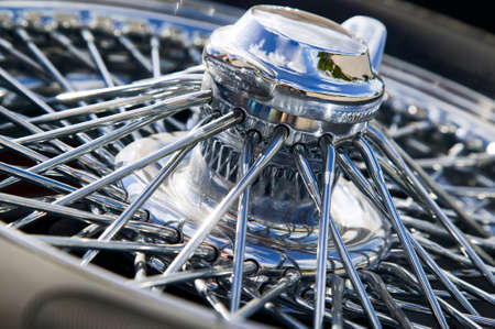 Part of old vintage white car, silver wheelの写真素材