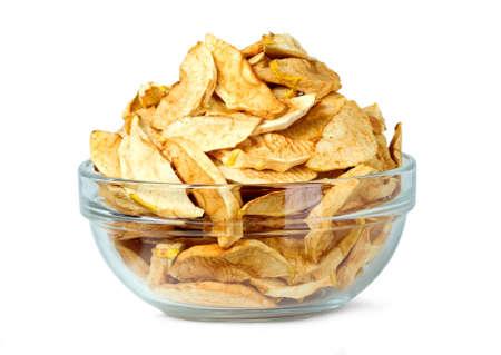 Sliced dry apples for snacks on white backgroundの写真素材