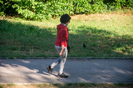 terni,italy may 31 2020 :woman doing physical activity at park in the morningのeditorial素材
