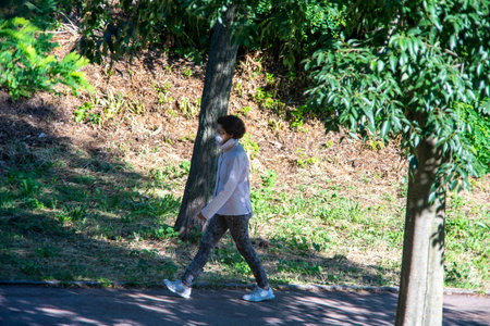 terni,italy may 31 2020 :woman doing physical activity at park in the morning