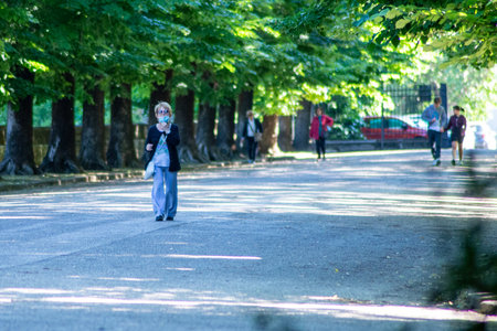 people walking in the parkのeditorial素材