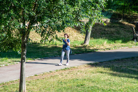 terni,italy june 01 2020 :women who exercise in the park in the morningのeditorial素材