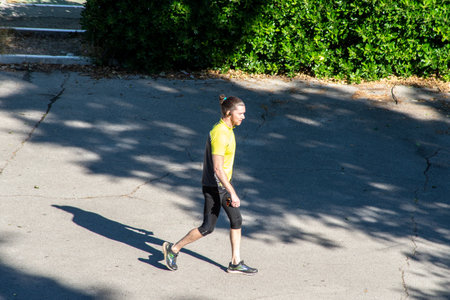 terni,italy june 01 2020 :man doing physical activity at park in the morningのeditorial素材