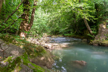 black river that comes from the marmore waterfallsの写真素材