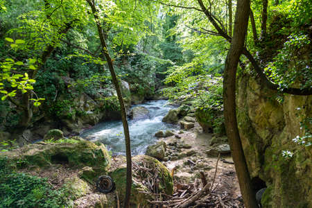 black river that comes from the marmore waterfallsの写真素材