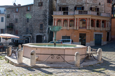 narni,italy june 29 2020 :fountain in Garibaldi square of Narni on a sunny dayのeditorial素材