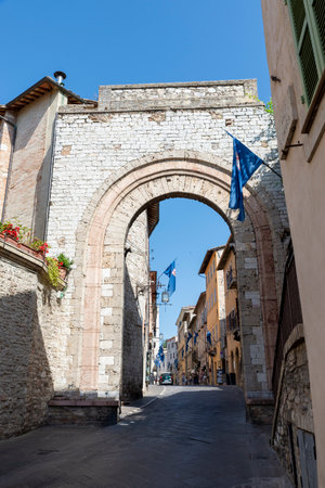 assisi,italy july 11 2020 :secondary door in street areatino village of assisiのeditorial素材