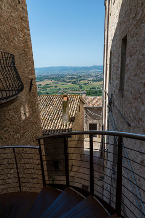 assisi,italy july 11 2020 :architecture of streets and buildings in the historic center of assisiのeditorial素材