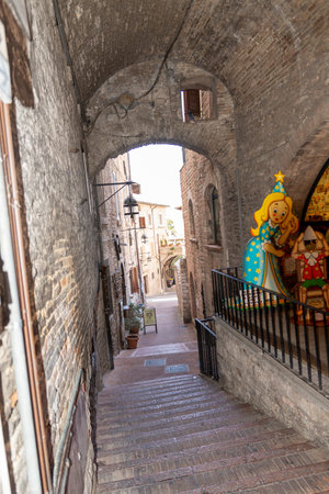 assisi,italy july 11 2020 :architecture of streets and buildings in the historic center of assisiのeditorial素材