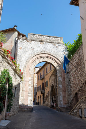 assisi,italy july 11 2020 :secondary door in street areatino village of assisiのeditorial素材