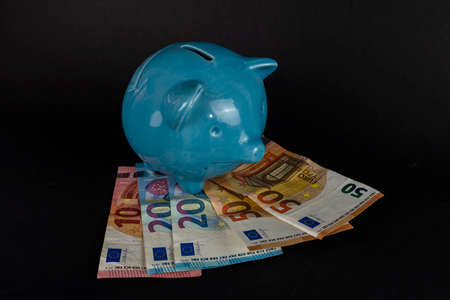 save from naio on top of euro banknotesの写真素材