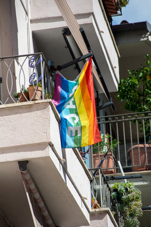 peace flag placed on a balcony of a houseのeditorial素材