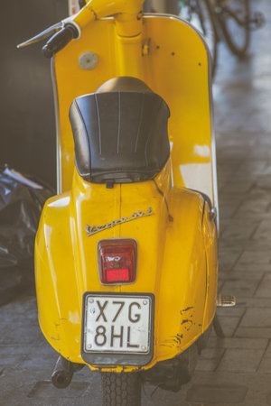 terni, italy september 05 2020: vintage piaggio vespa in yellow colorのeditorial素材