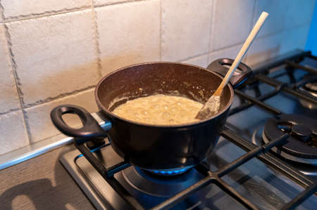 risotto with truffles and parmesan boiling in a potの写真素材