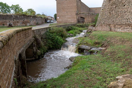 the waterfall of nepi surrounded by greenery in provoncia di romeの写真素材