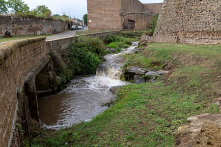 the waterfall of nepi surrounded by greenery in provoncia di romeの写真素材