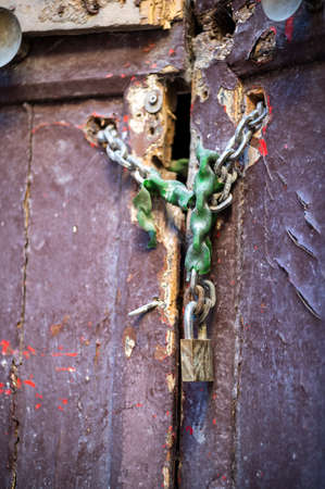 knocker in the shape of a knocking hand in black metalの写真素材